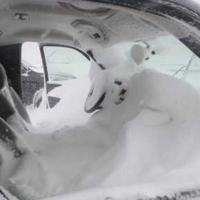 Even more pictures of cars covered in snow…